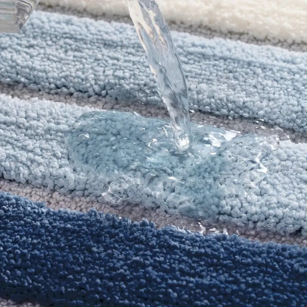 Soft striped gray bath mat with non-slip backing, absorbent plush bathroom rug for shower and tub area