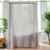 Light green sheer shower curtain with grid pattern and tassel trim, waterproof bathroom curtain for modern home decor