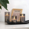 Set of flameless LED pillar candles with frosted glass, realistic battery-operated candles for home decor and ambient lighting