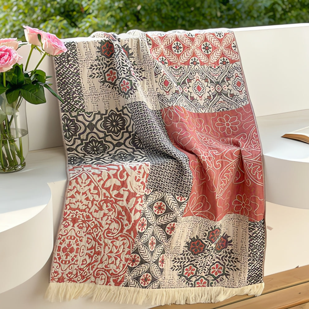 Soft throw blanket with Van Gogh inspired starry night design in blue and yellow, with fringe edges