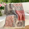 Soft throw blanket with Van Gogh inspired starry night design in blue and yellow, with fringe edges