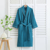 Pink waffle bathrobe with shawl collar, front pockets, and waist belt – lightweight cotton robe for women