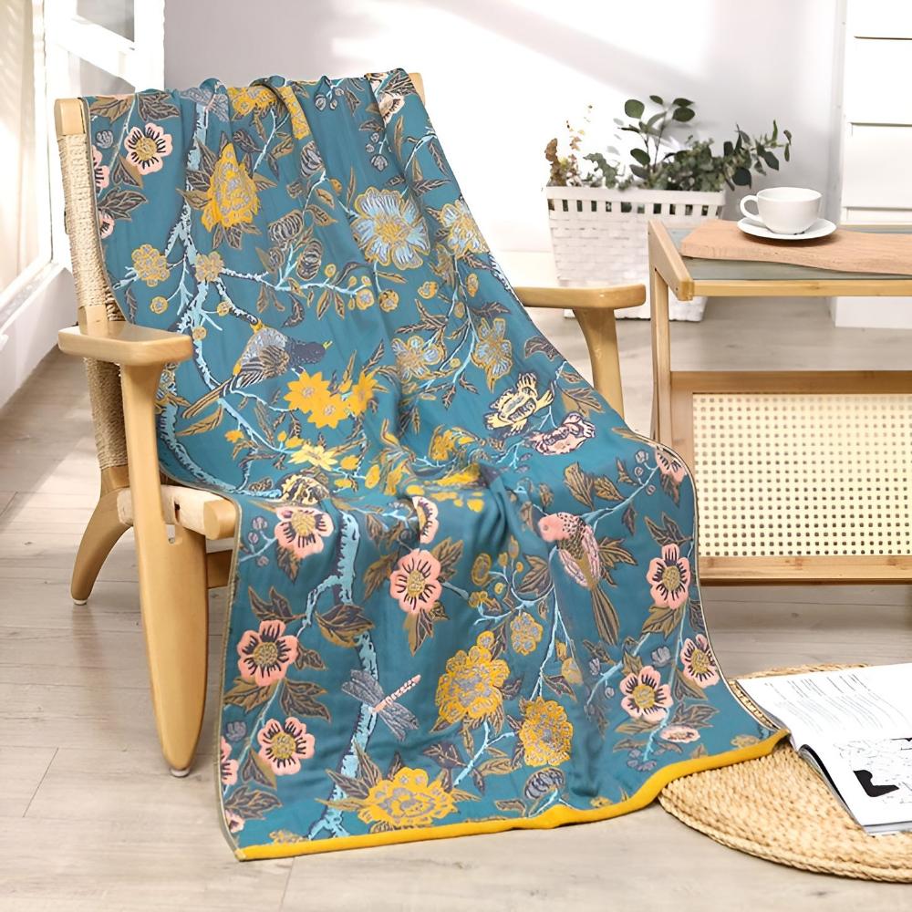 Floral throw blanket with orange background and blue yellow flower design, soft decorative sofa and bed cover