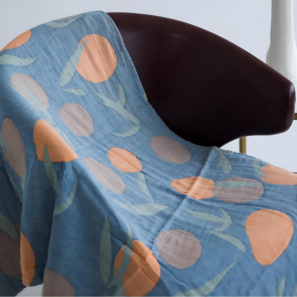 Blue throw blanket with orange fruit and leaf pattern, lightweight cotton decorative sofa and bed cover