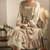 Vintage linen apron in dusty beige with ruffle hem and waist tie, cottagecore cooking and gardening apron for women