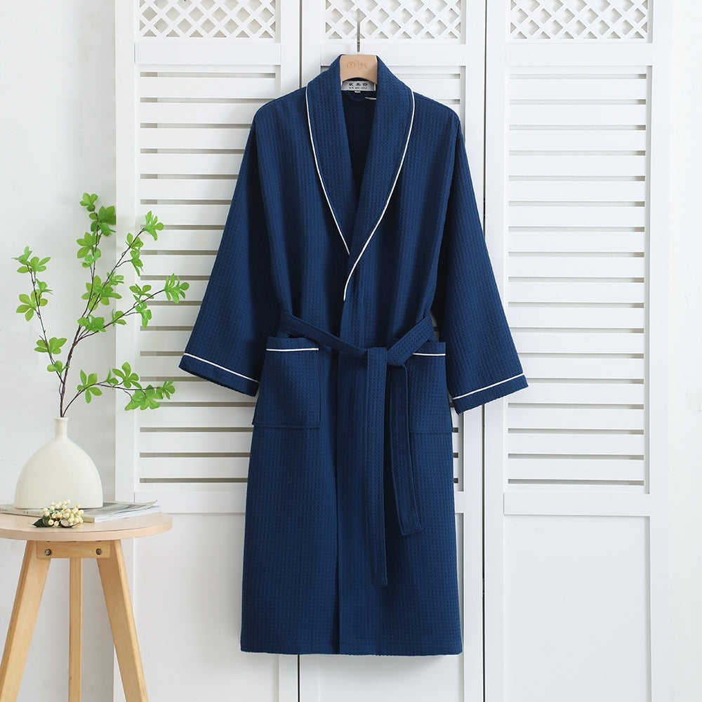 Pink waffle bathrobe with shawl collar, front pockets, and waist belt – lightweight cotton robe for women