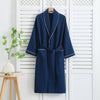 Pink waffle bathrobe with shawl collar, front pockets, and waist belt – lightweight cotton robe for women
