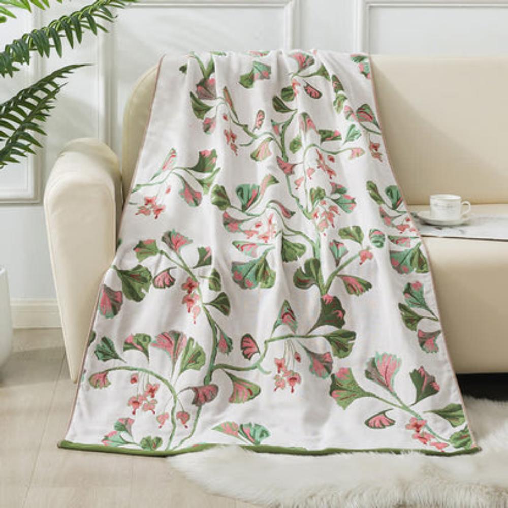 Elegant floral throw blanket with beige background and gold pink leaf design, soft decorative sofa and bed cover
