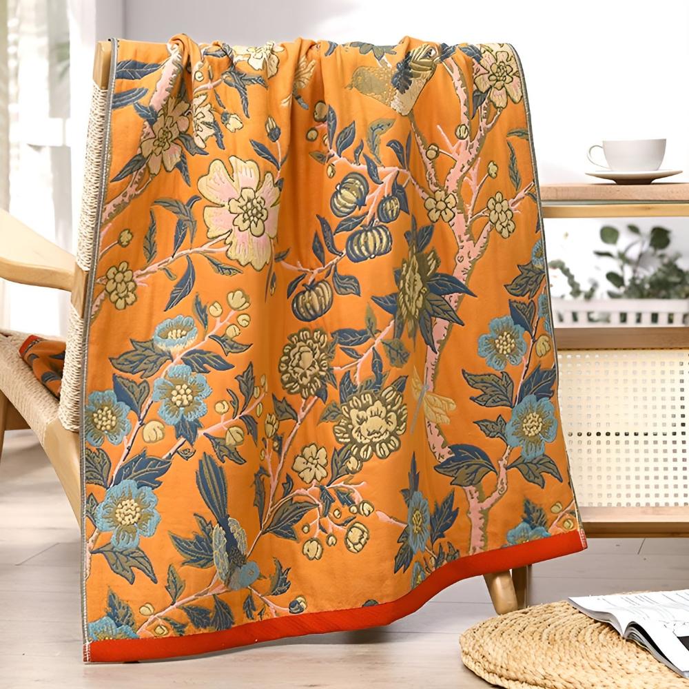 Floral throw blanket with orange background and blue yellow flower design, soft decorative sofa and bed cover