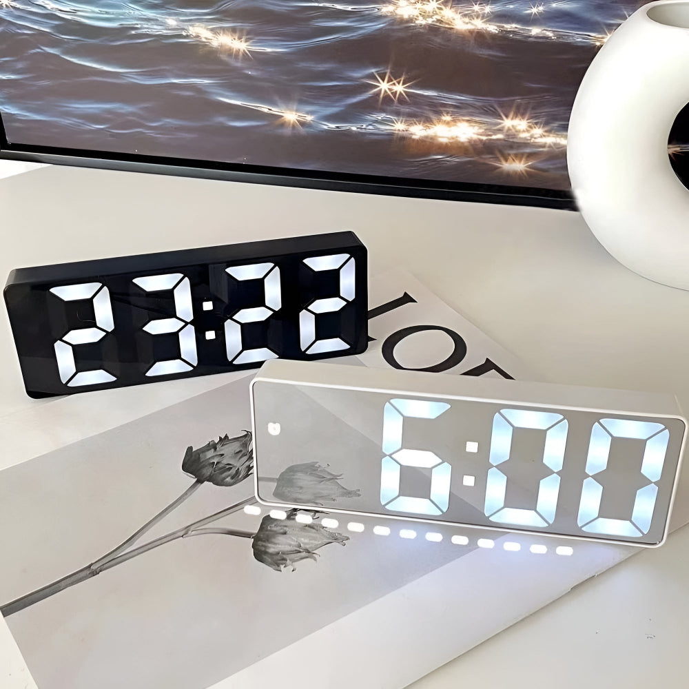 Modern LED digital alarm clock in black and white with large display, 12/24 hour format and night light feature