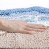Bath mat – Plush microfiber blend – Seaside footprint design – Non-slip for safety – Coastal bathroom decor
