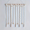 Boho macrame photo display wall hanging with wooden rod, handmade cotton rope picture holder for home decor
