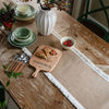 Rustic burlap table runner with crochet lace trim, farmhouse dining table decor for vintage and boho home styling