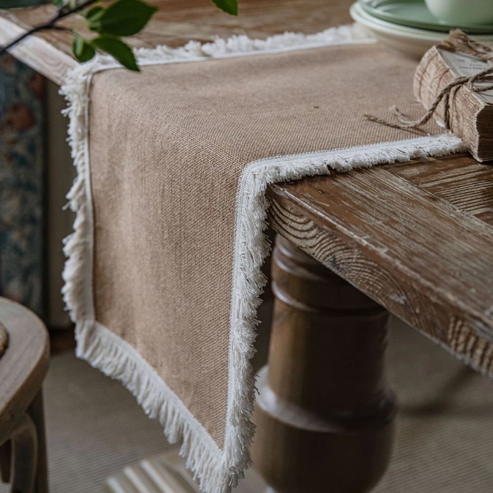 Rustic burlap table runner with crochet lace trim, farmhouse dining table decor for vintage and boho home styling
