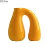 Ceramic vase – N-shape design – Elegant flower display for home decor – 10 x 4 x 6 in