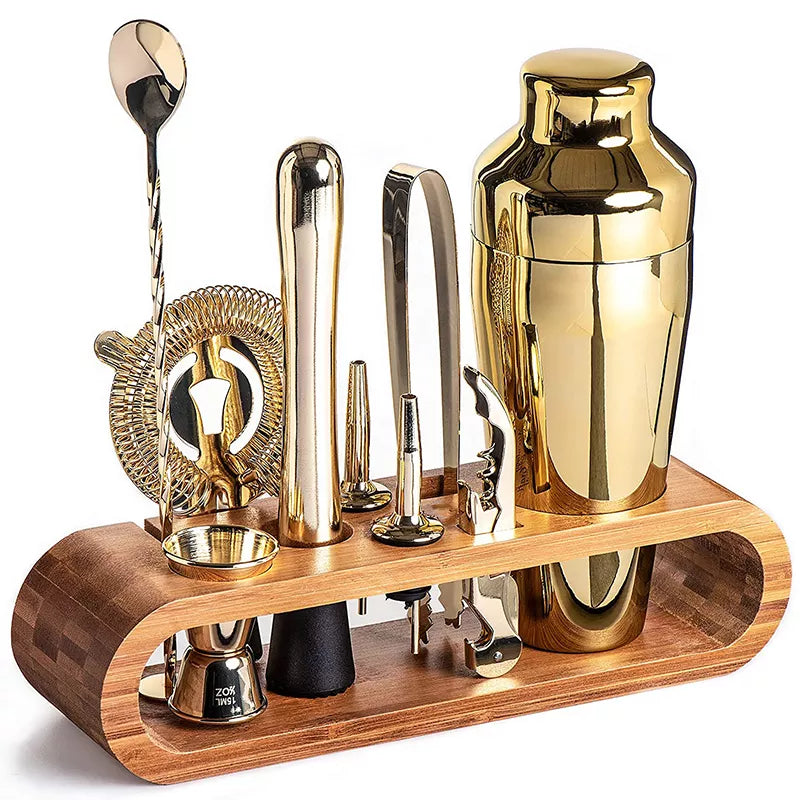 Premium stainless steel cocktail shaker set with mixing spoon, citrus slices, and bar tools – professional bartender kit for home and party drinks