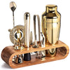 Premium stainless steel cocktail shaker set with mixing spoon, citrus slices, and bar tools – professional bartender kit for home and party drinks
