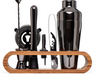 Premium stainless steel cocktail shaker set with mixing spoon, citrus slices, and bar tools – professional bartender kit for home and party drinks