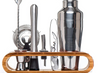 Premium stainless steel cocktail shaker set with mixing spoon, citrus slices, and bar tools – professional bartender kit for home and party drinks