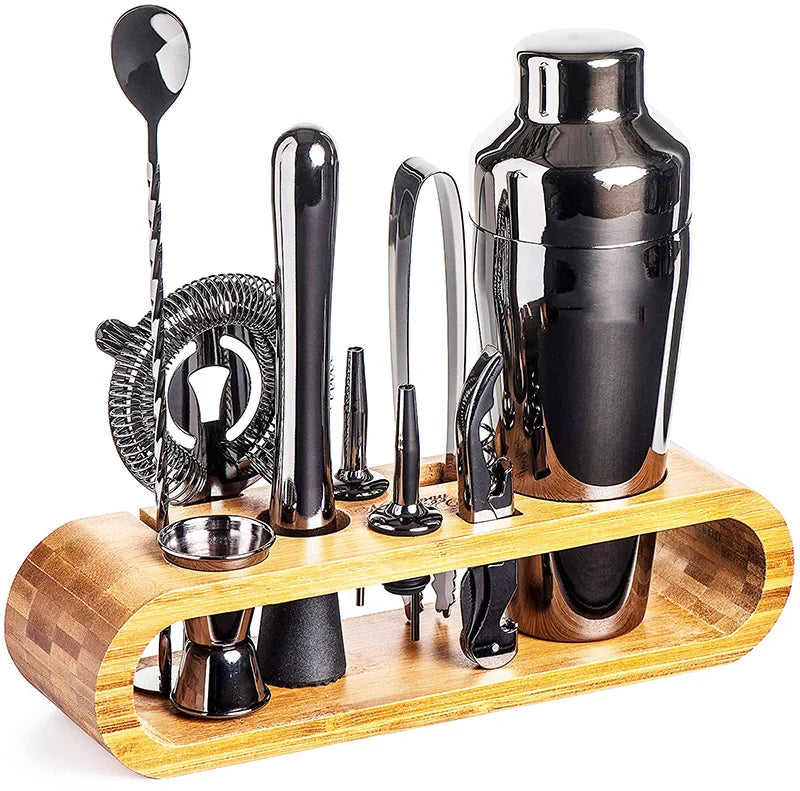 Premium stainless steel cocktail shaker set with mixing spoon, citrus slices, and bar tools – professional bartender kit for home and party drinks