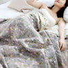 Cotton quilt – Reversible design – Leafy floral print – Lightweight comfort