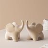 Flocked resin elephant figurine – Soft gray – Charming home decor – Ideal for living room or bedroom – 6 x 4 x 5 in
