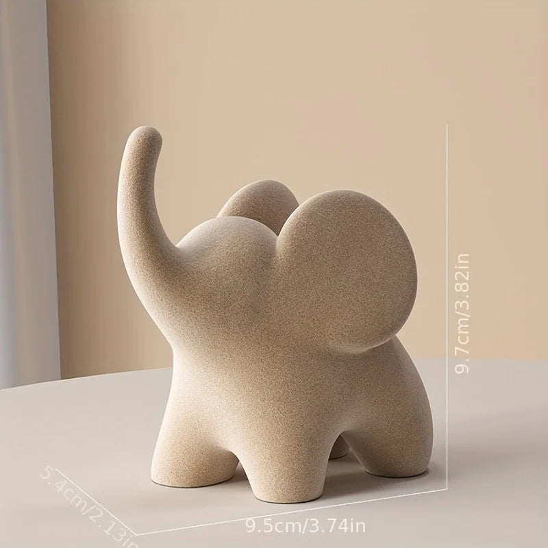 Flocked resin elephant figurine – Soft gray – Charming home decor – Ideal for living room or bedroom – 6 x 4 x 5 in