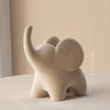 Flocked resin elephant figurine – Soft gray – Charming home decor – Ideal for living room or bedroom – 6 x 4 x 5 in