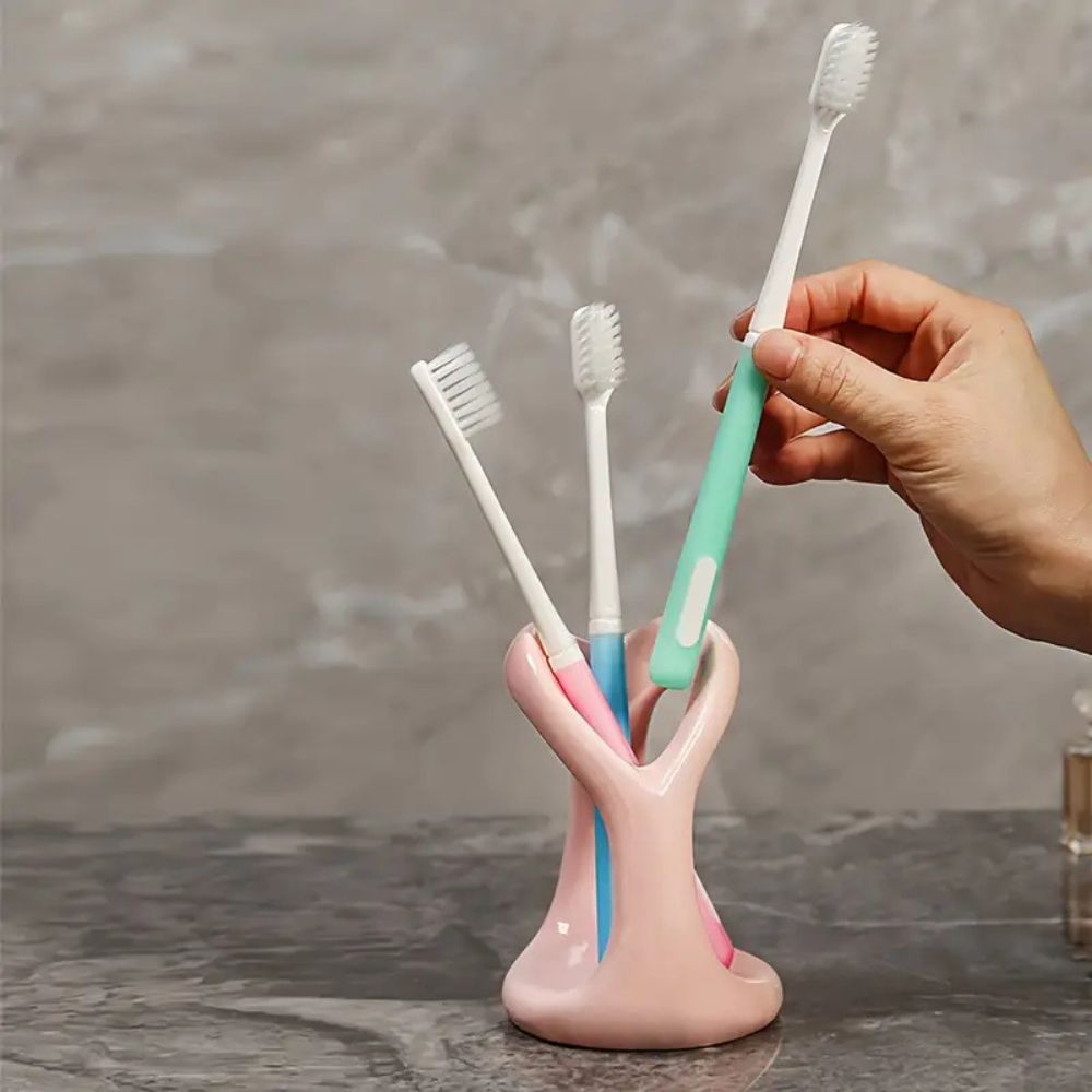Modern ceramic toothbrush and toothpaste holder, bathroom countertop organizer for oral care storage