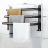 Wall-mounted black metal towel rack with multi-bar design, space-saving bathroom organizer for towels and linens