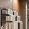 Wall-mounted black metal towel rack with multi-bar design, space-saving bathroom organizer for towels and linens