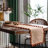 Jute table runner – Durable material – Vibrant orange pom-poms – Bohemian style for dining or living room decor