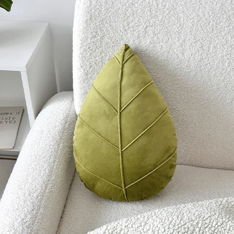 Leaf-shaped pillow – Plush material – Green design – Cozy living room accent