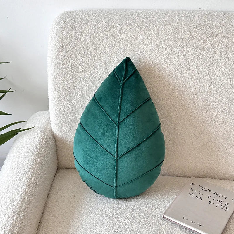 Leaf-shaped pillow – Plush material – Green design – Cozy living room accent
