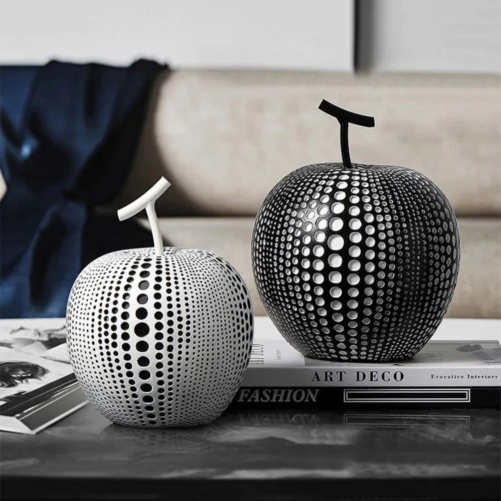 Modern black and white apple sculpture decor with polka dot design, contemporary resin ornaments for living room or office display