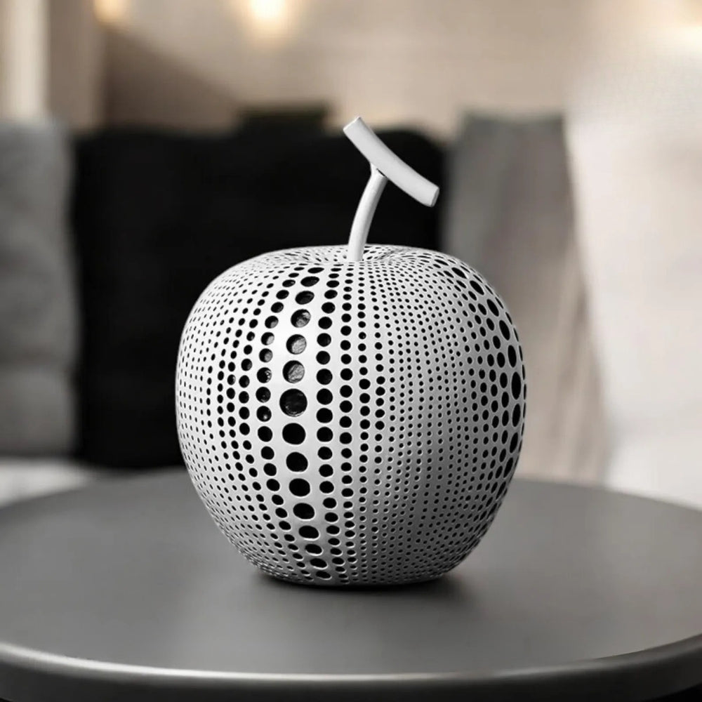 Modern black and white apple sculpture decor with polka dot design, contemporary resin ornaments for living room or office display