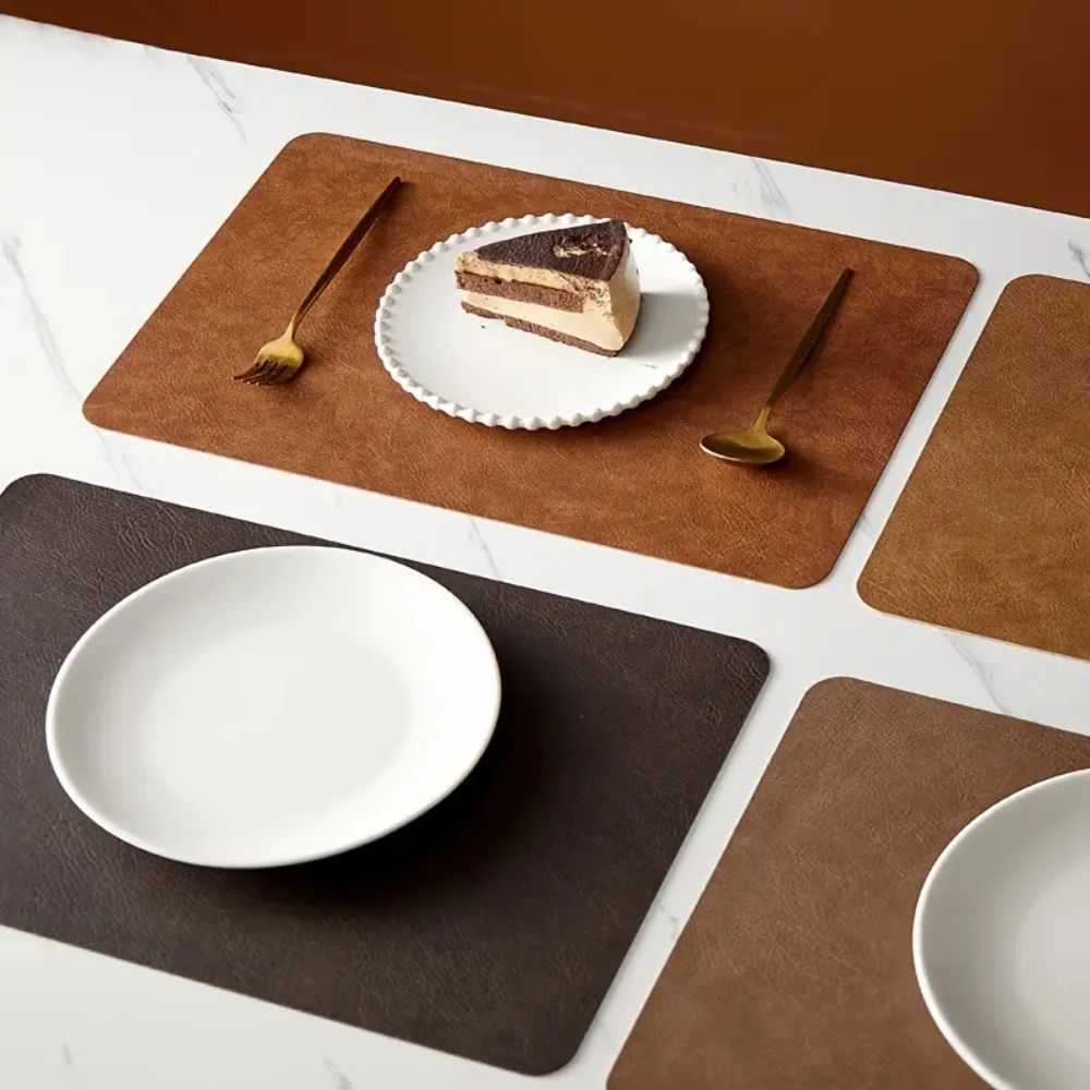 Set of leather dining placemats in brown tones, heat-resistant table mats for kitchen and dining room deco