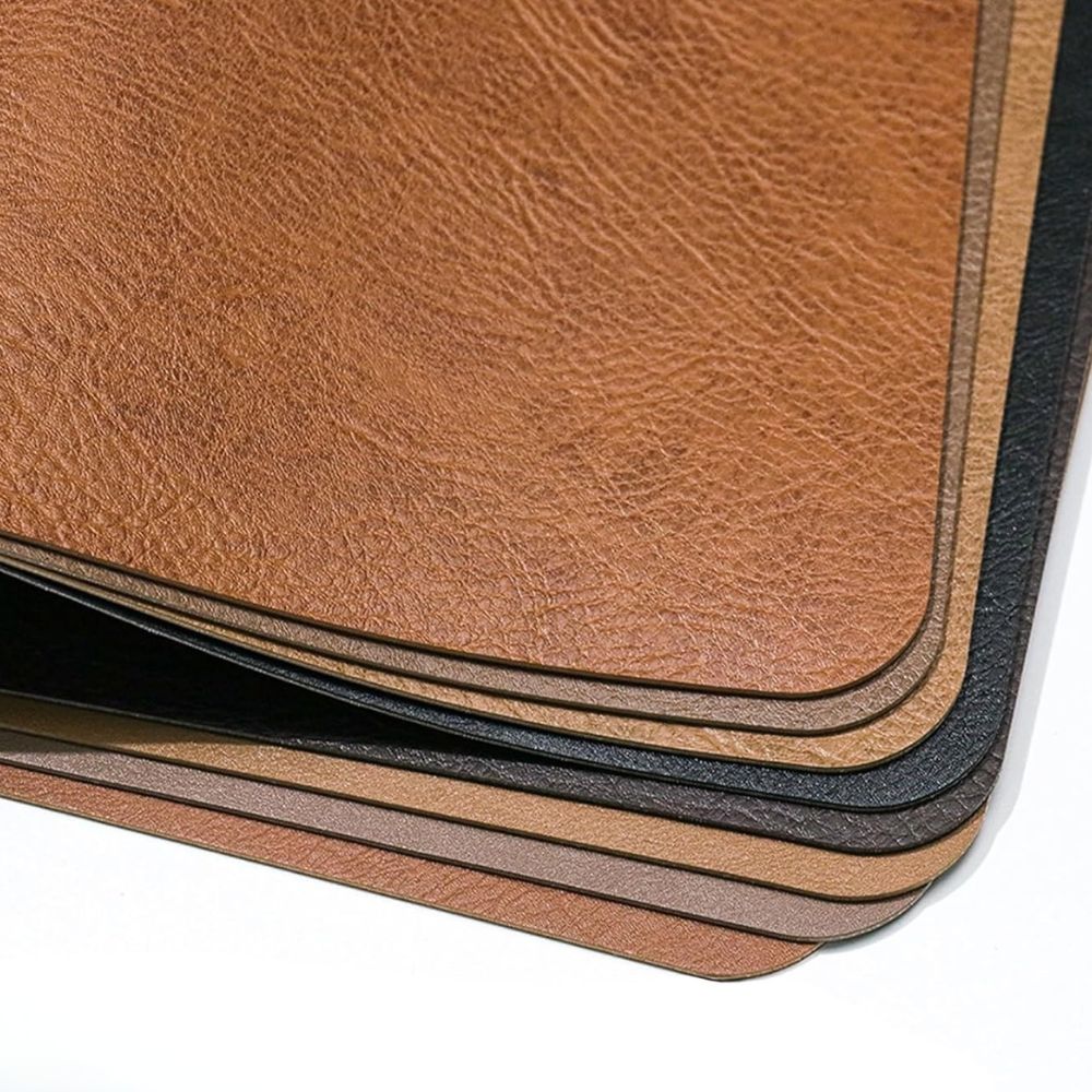Set of leather dining placemats in brown tones, heat-resistant table mats for kitchen and dining room deco