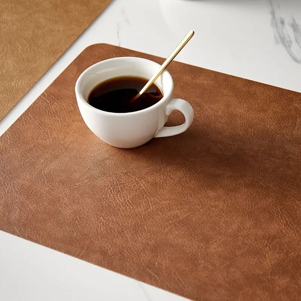 Set of leather dining placemats in brown tones, heat-resistant table mats for kitchen and dining room deco