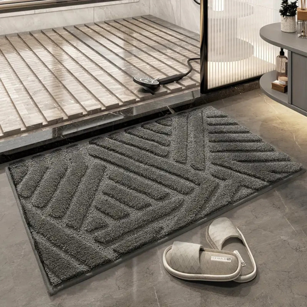 Anti-slip white bathroom rug with modern geometric embossed pattern, soft absorbent bath mat for bathroom and shower area