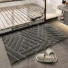 Anti-slip white bathroom rug with modern geometric embossed pattern, soft absorbent bath mat for bathroom and shower area