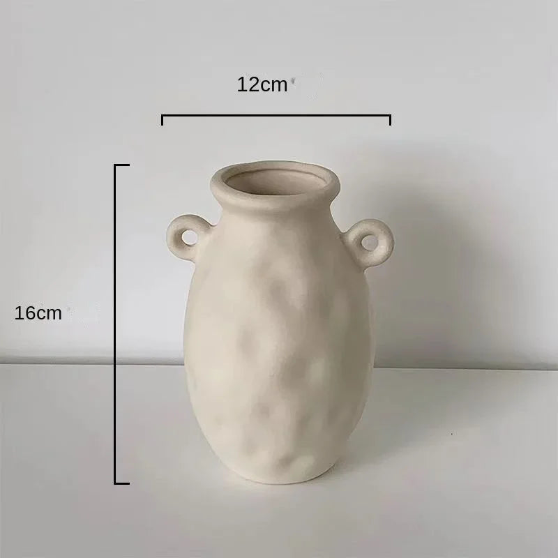 Set of modern abstract ceramic vases in matte beige, minimalist home decor for living room or dining table display