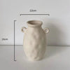 Set of modern abstract ceramic vases in matte beige, minimalist home decor for living room or dining table display