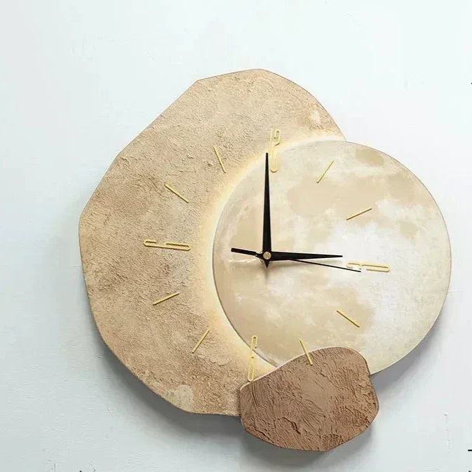 Modern LED wall clock with abstract stone design and golden deer, decorative timepiece for living room or office decor