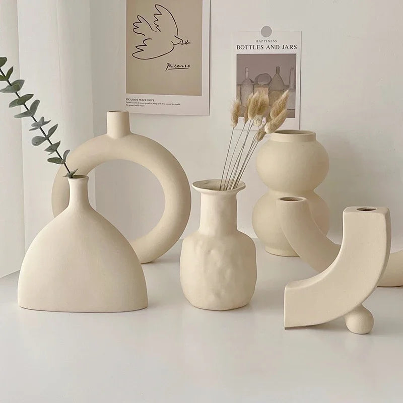 Set of modern abstract ceramic vases in matte beige, minimalist home decor for living room or dining table display