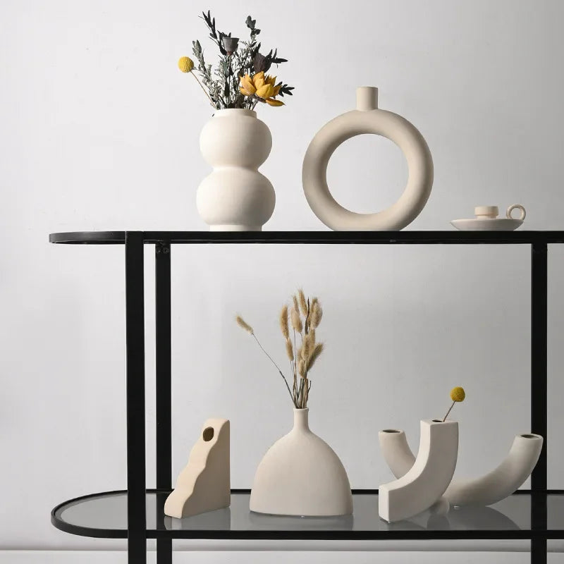 Set of modern abstract ceramic vases in matte beige, minimalist home decor for living room or dining table display