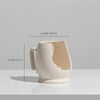 Set of modern abstract ceramic vases in matte beige, minimalist home decor for living room or dining table display