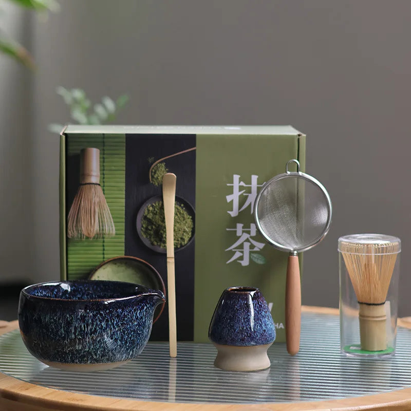 Traditional Japanese matcha tea set with ceramic bowl, bamboo whisk, scoop, sifter, and whisk holder – complete matcha making kit