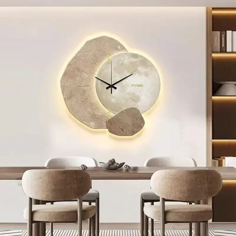 Modern LED wall clock with abstract stone design and golden deer, decorative timepiece for living room or office decor