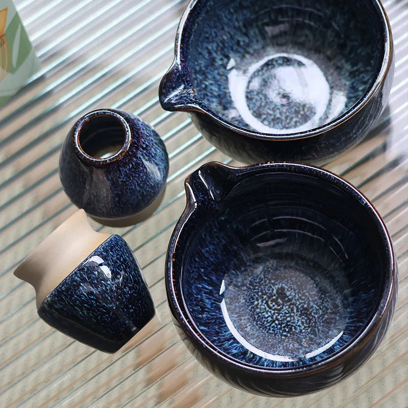Traditional Japanese matcha tea set with ceramic bowl, bamboo whisk, scoop, sifter, and whisk holder – complete matcha making kit